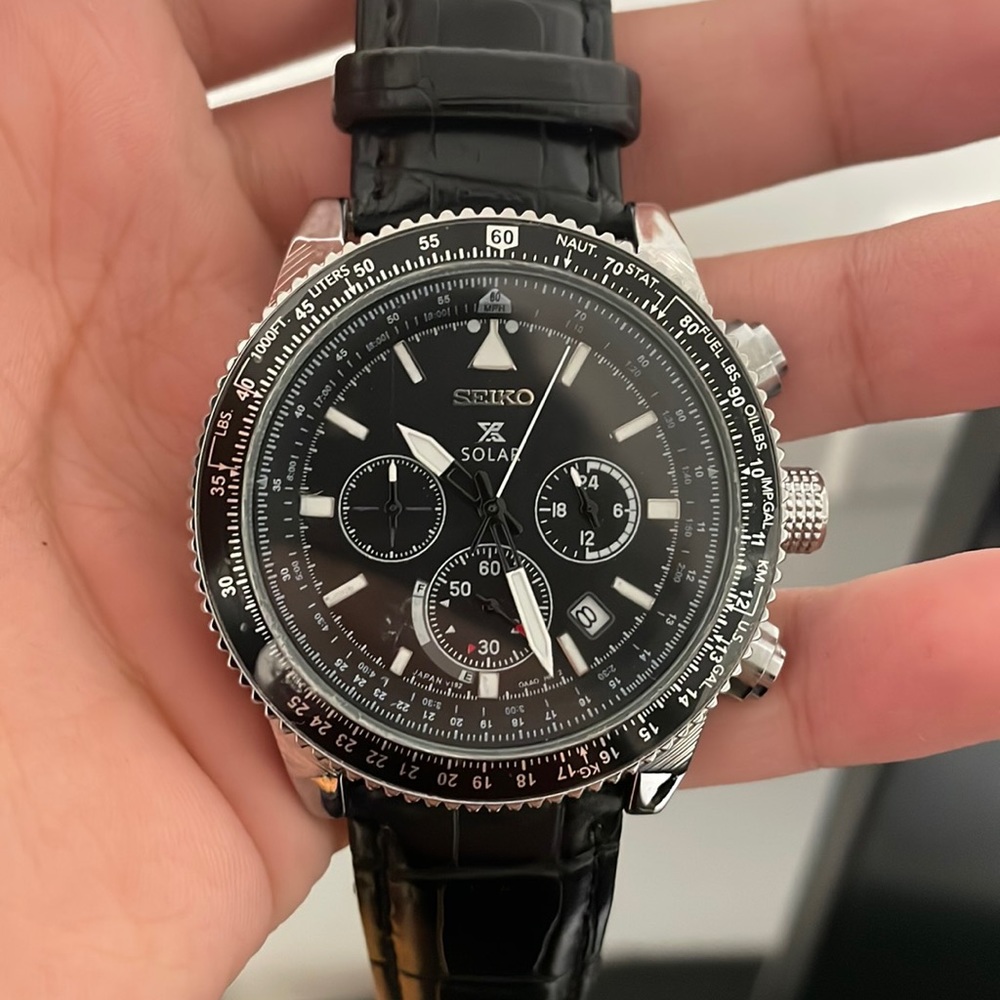 A new seiko watch with black leather straps